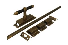 Crémone en applique pour fenêtre laiton patiné (1890)