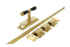 Crémone en applique pour fenêtre laiton poli (1908)