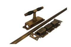 Crémone en applique pour fenêtre laiton patiné (1928)