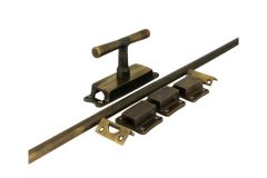 Crémone en applique pour fenêtre (1915) laiton patiné