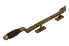 Entrebâilleur de fenêtre laiton patiné bois d'ébène (1932)